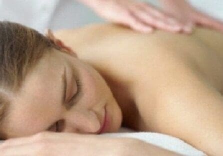 Woman having back massage.